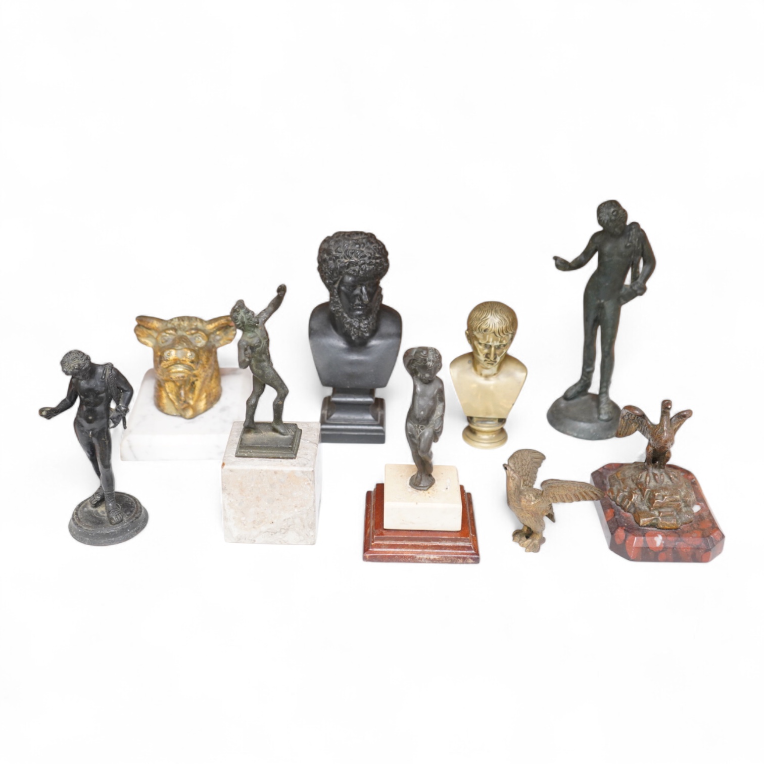 Italian grand tour souvenirs, 19th/20th century; nine small sculptures and busts, after the antique, the majority bronze and one depicting Lucius Verus, largest 19cm high